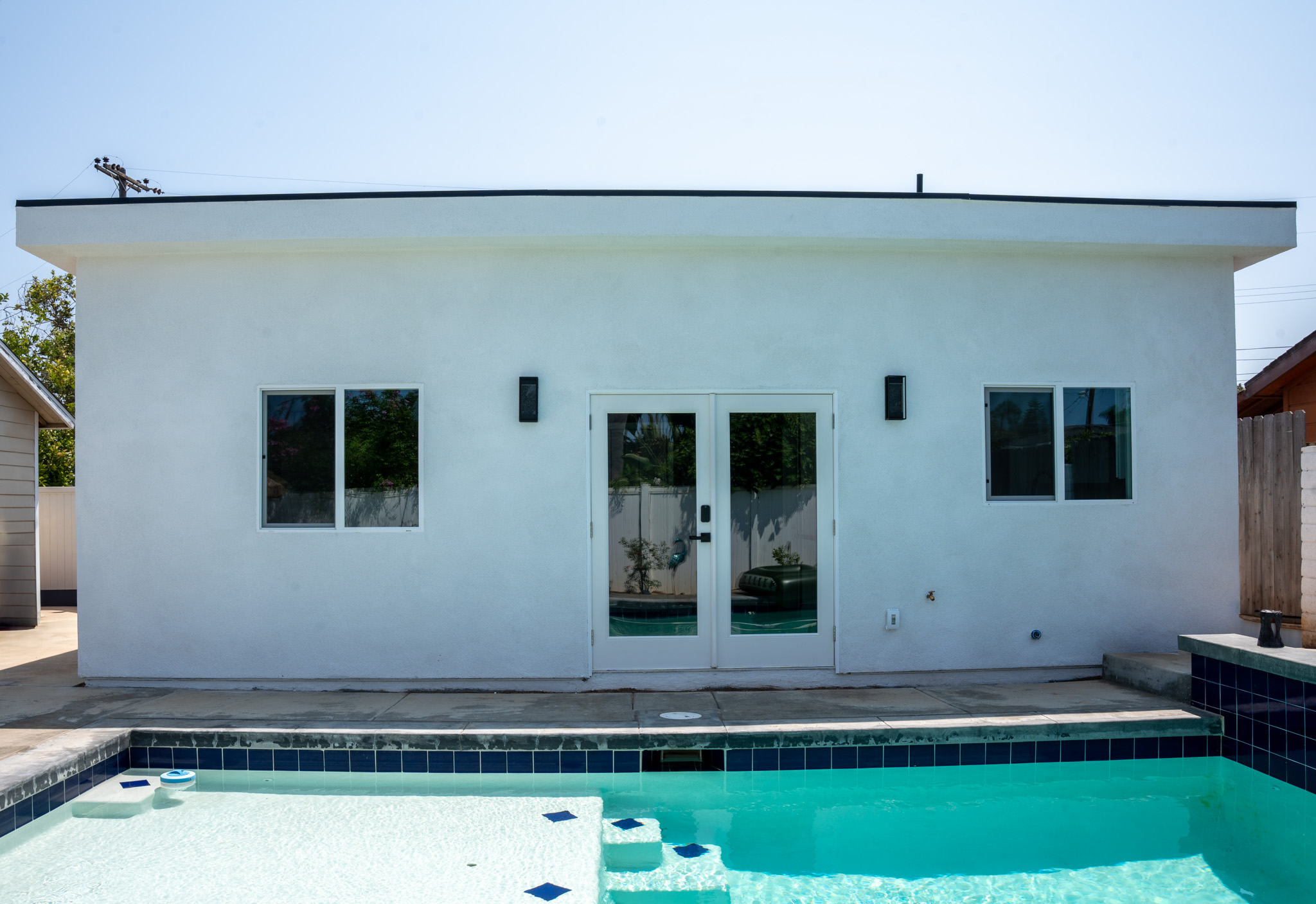 Garage conversion with room addition creating a 2-bedroom ADU in San Diego