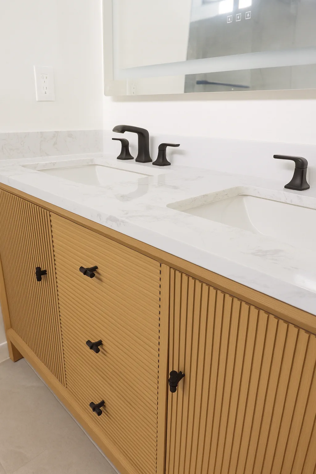 Bathroom vanity in a master suite addition